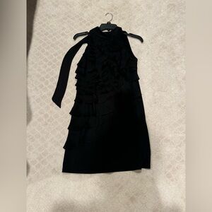 Black Ruffle front cocktail dress w/ Flower Pin.  Stretch material.